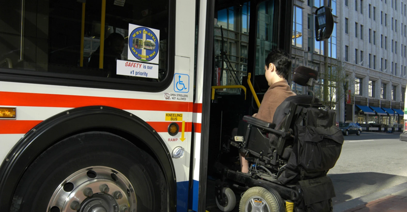 A person catching a bus
